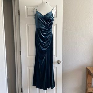 Blue velvet revelry dress with slit. Ordered size 6 but is altered to a size 4